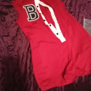 Vibrant Red Sleeveless Jumpsuit with Bold Letter Accent